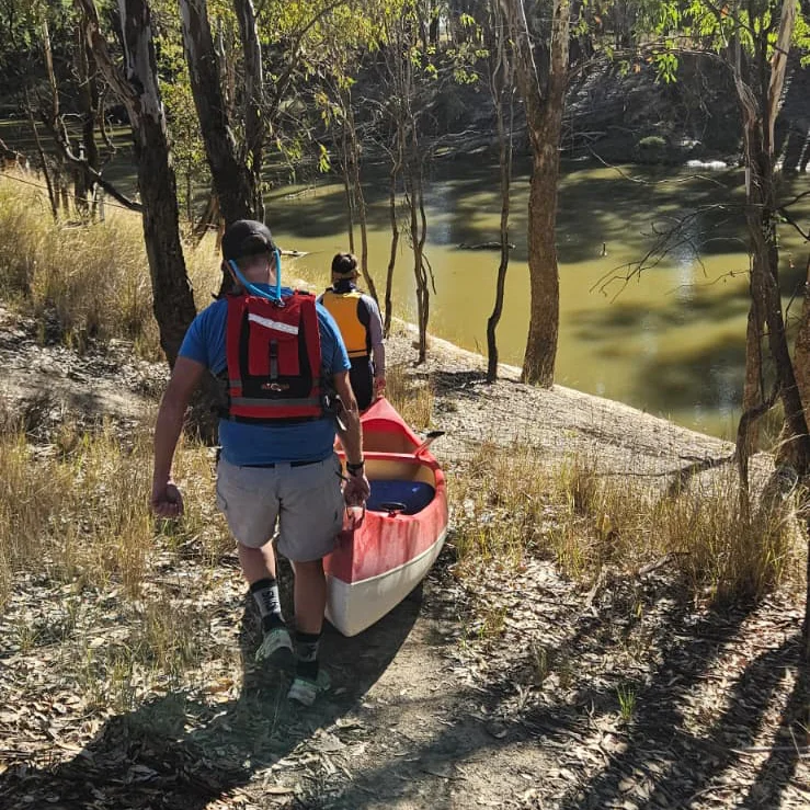 Carrying canoe